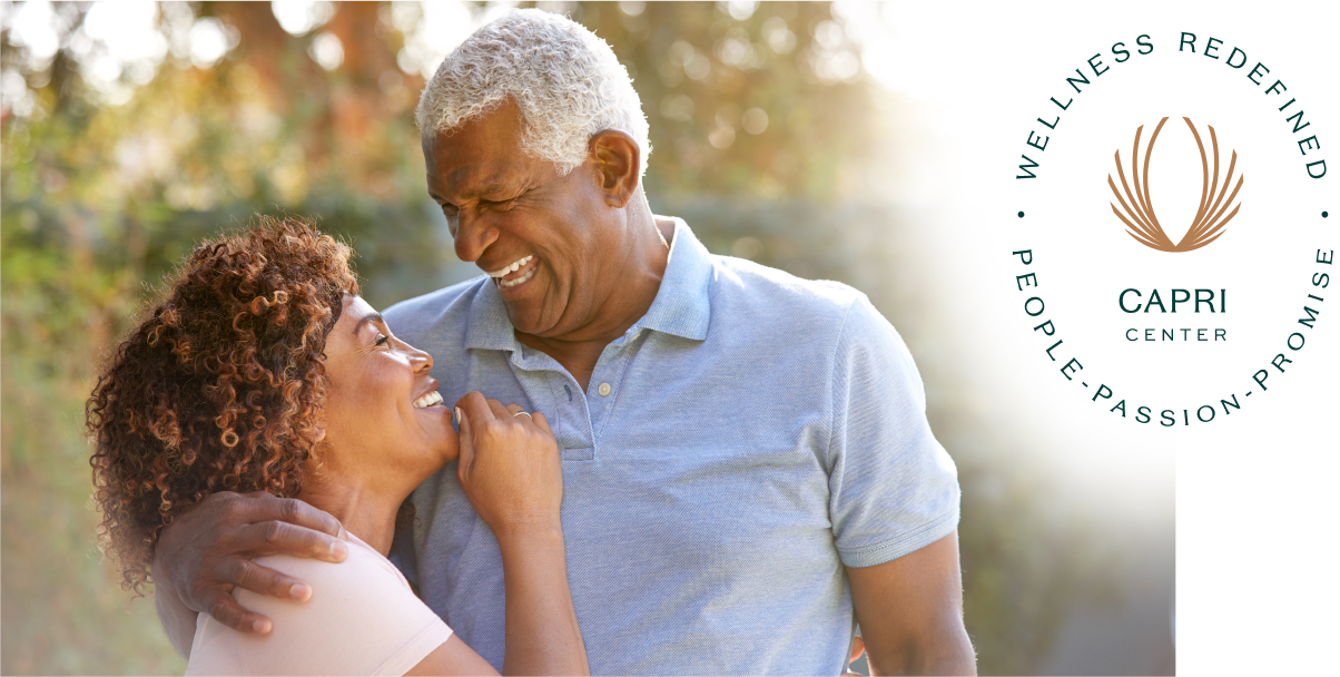 portrait-of-smiling-senior-african-american-couple-53JSG9Y-1 1